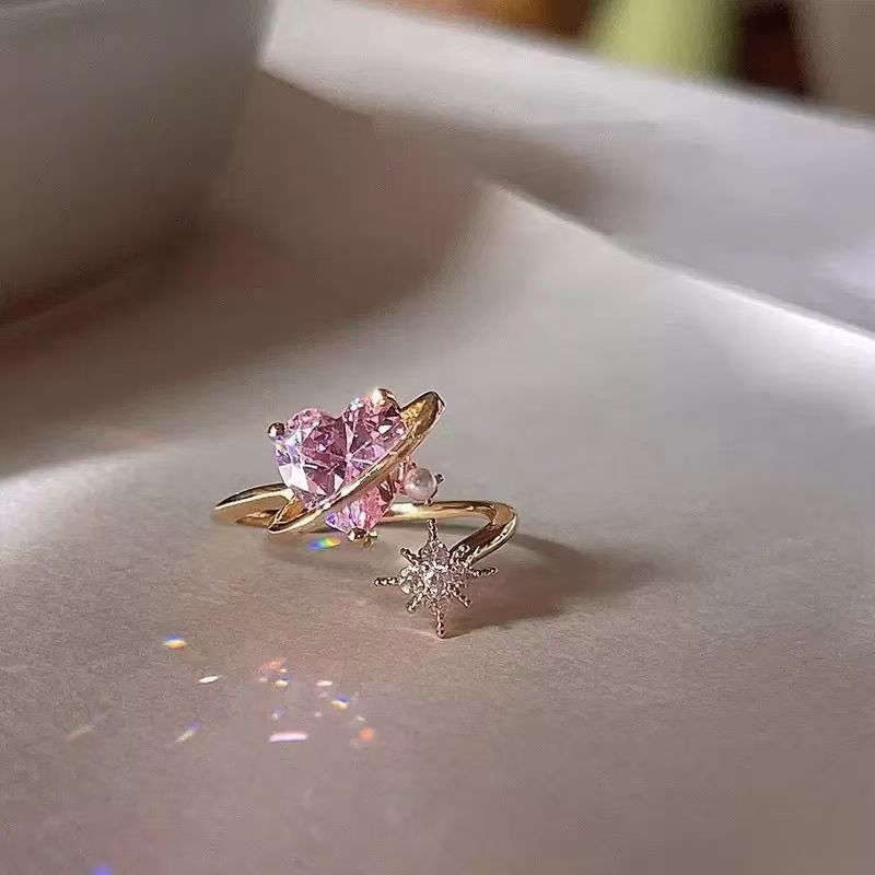 Pink heart-shaped open ring