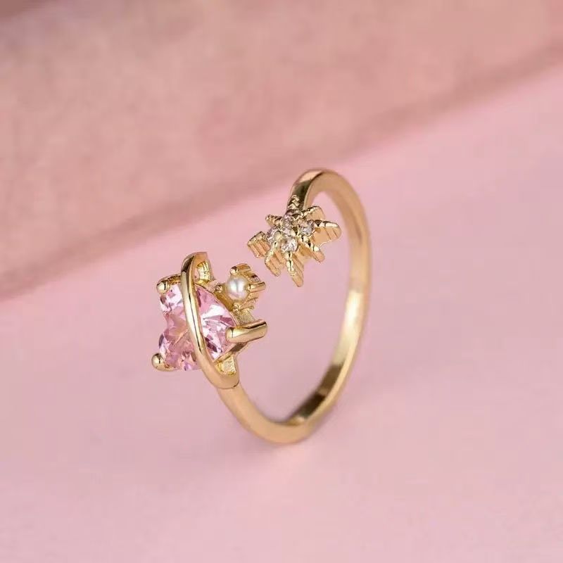 Pink heart-shaped open ring